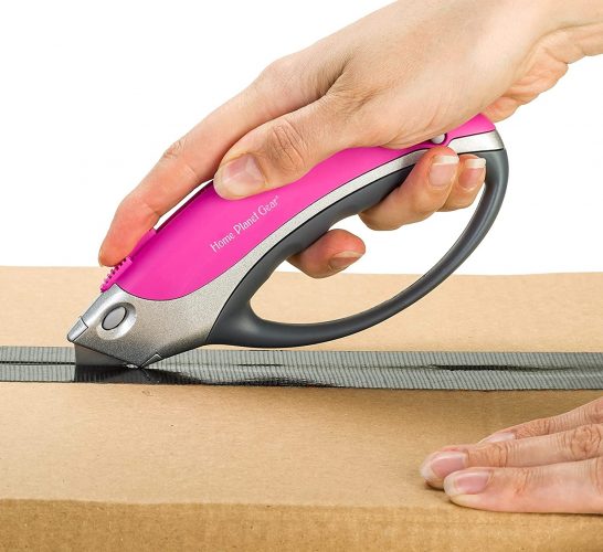 Pink Cutter showing hands cutting box